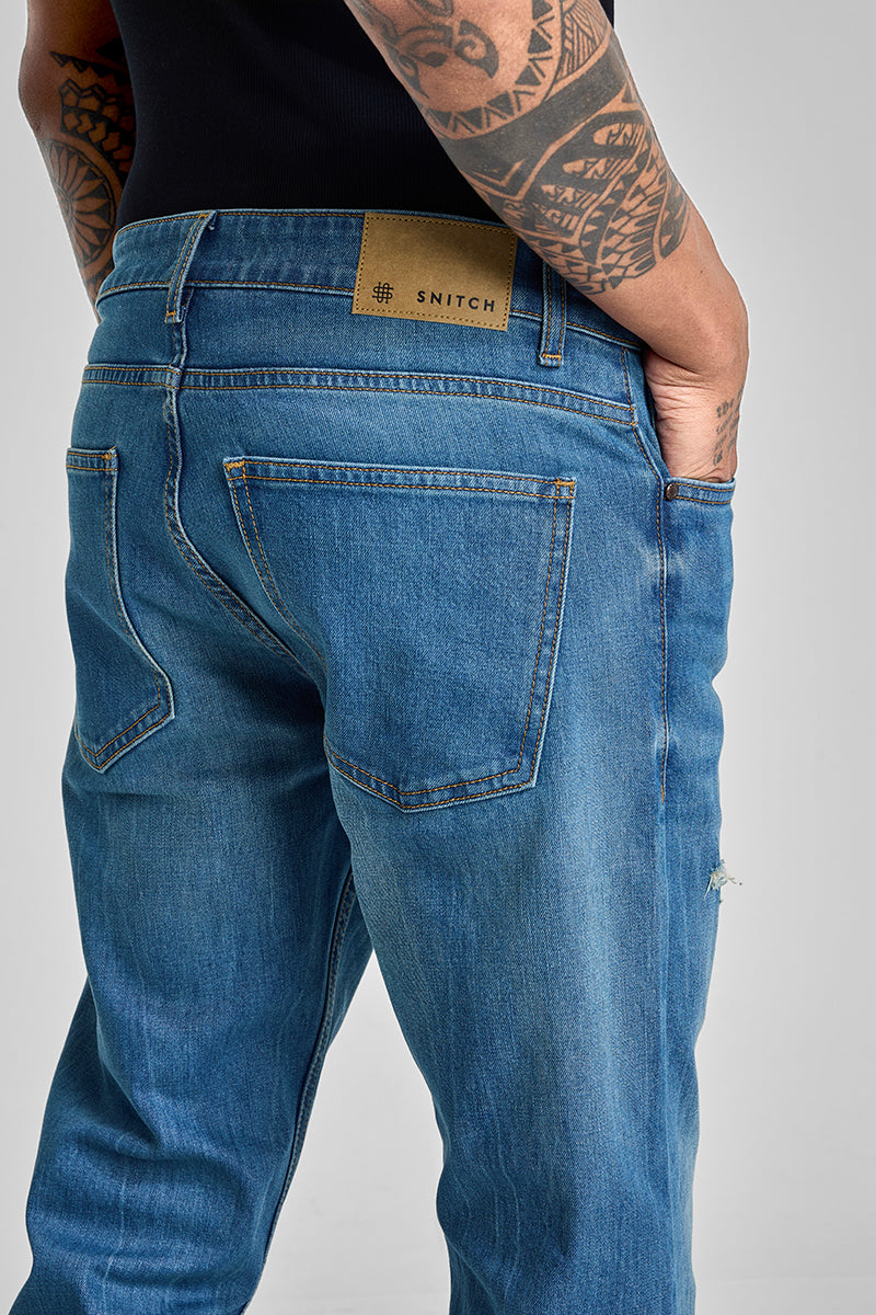 Blue Distressed Bootcut Jeans